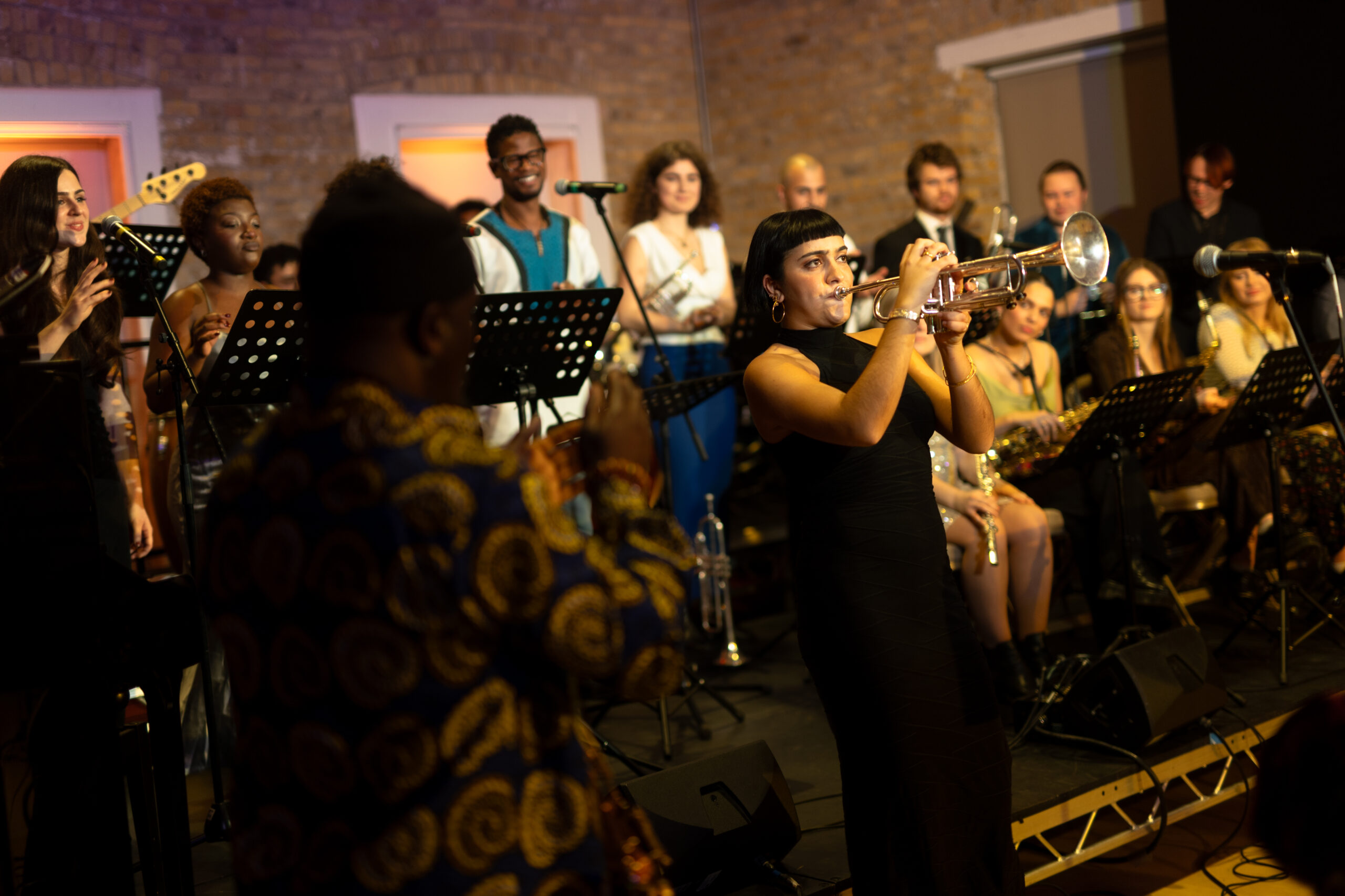 NYJO 60 at Woolwich Works A group of musicians performing