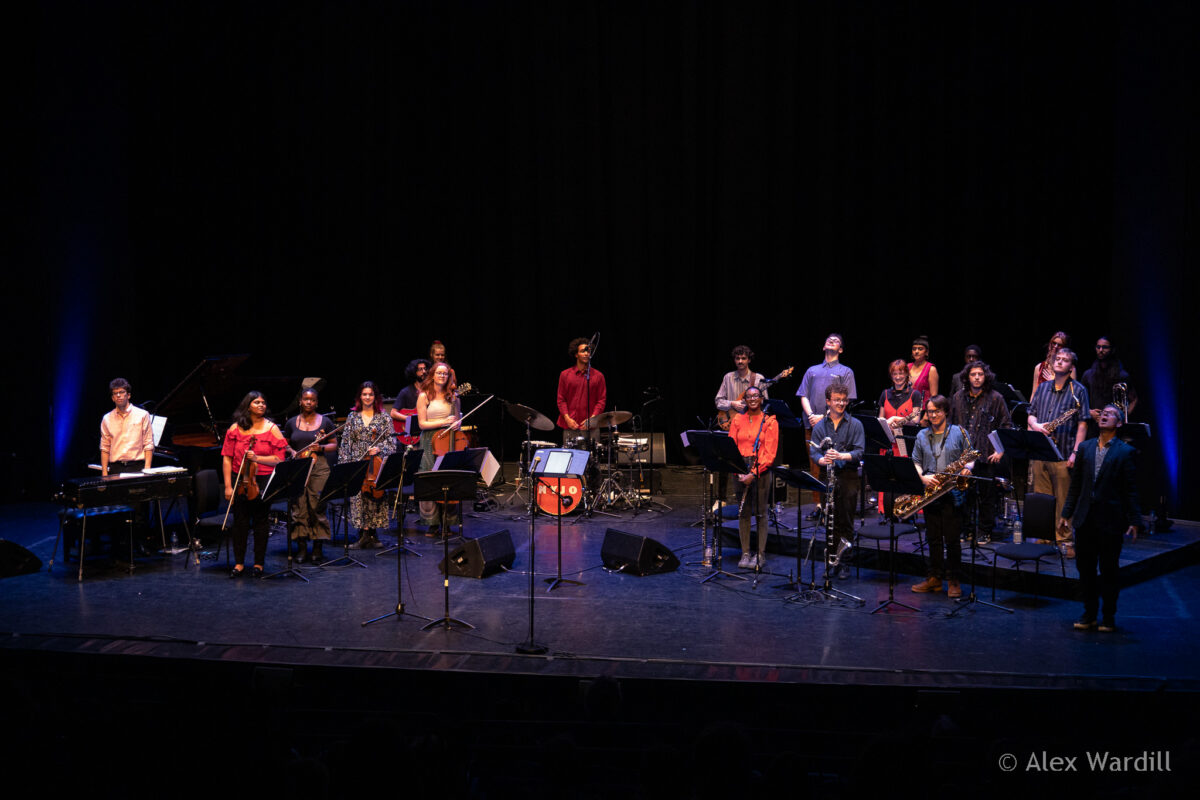 An NYJO ensemble group of musicians on stage