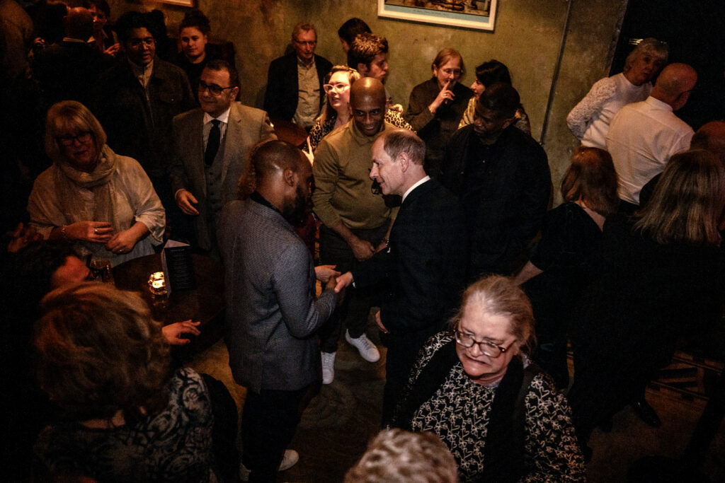  His Royal Highness The Duke of Edinburgh and guests at a reception at Alfies a big group of people taken from above